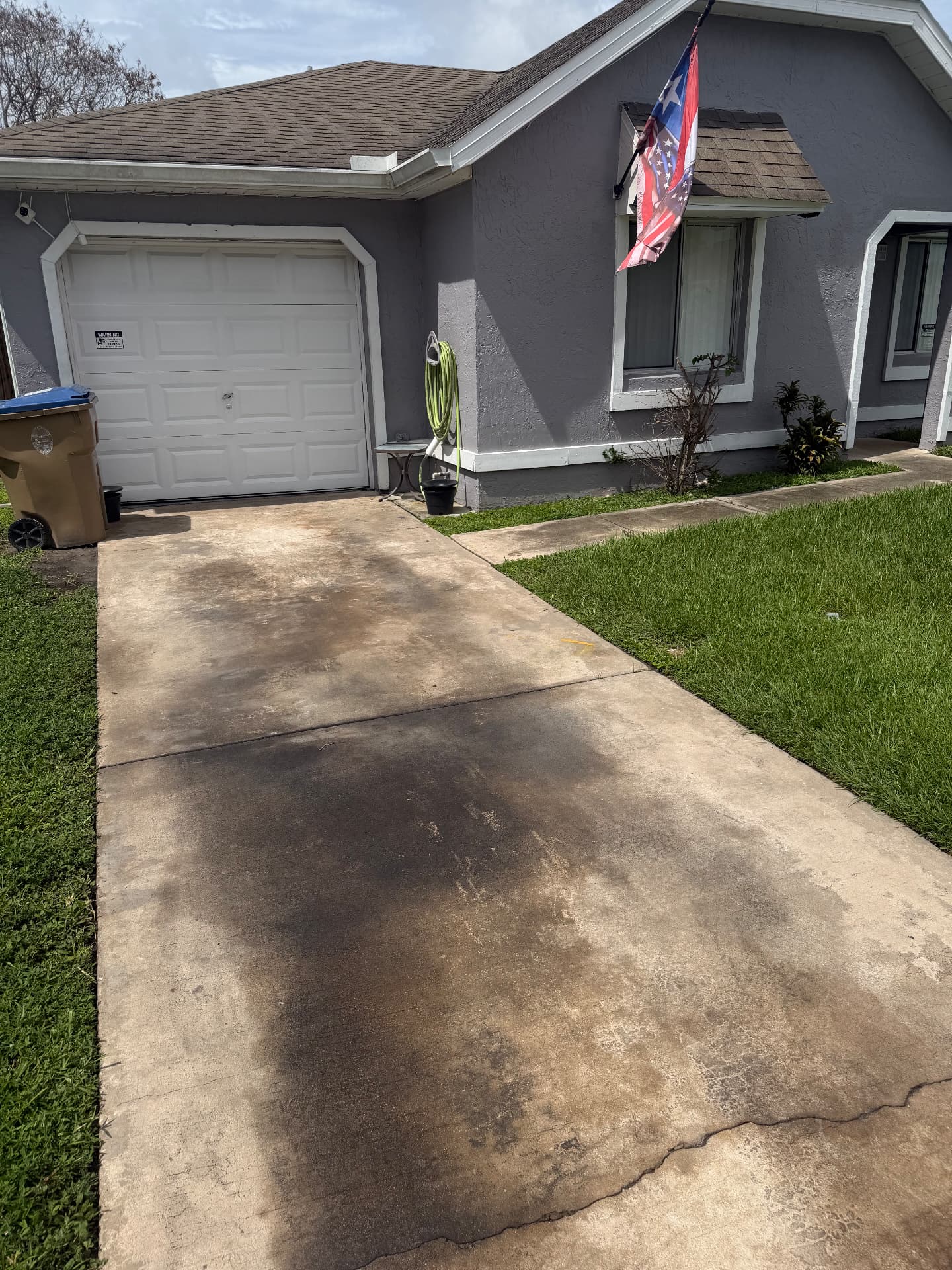Driveway pressure wash before
