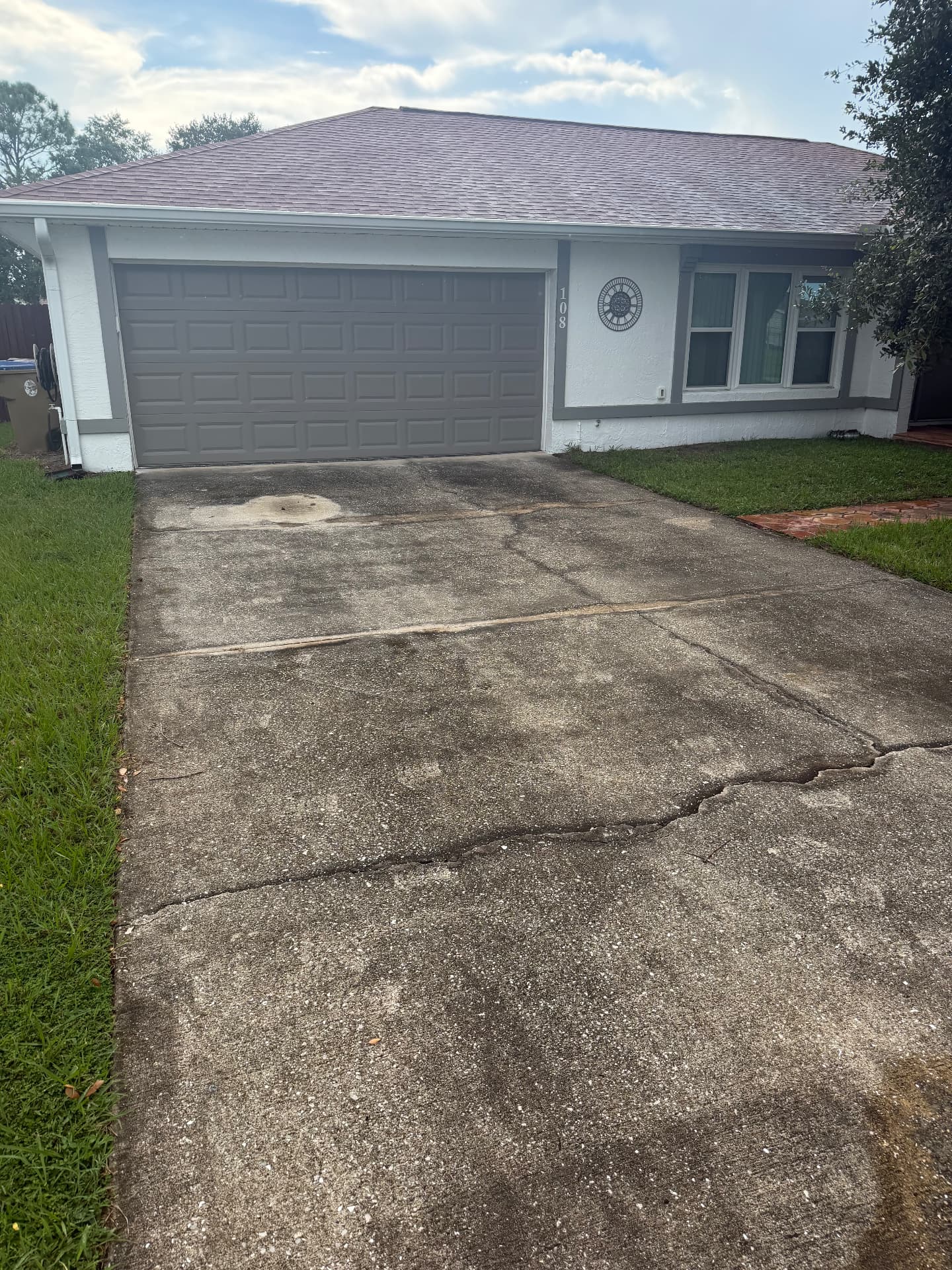 Driveway pressure wash before